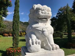 05A The Chinese male guardian lion leans his paw on an embroidered ball Chinese Garden Royal Botanical Hope Gardens Kingston Jamaica